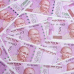 The brand new Indian currency bank notes of 2000 and 500 rupees bundle. Success and got profit from business